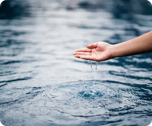 hand over water